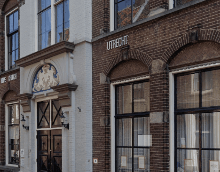 FNL Circle Gathering locatie, voorgevel van de historische Boothstraatkerk in Utrecht, met bakstenen architectuur en grote ramen